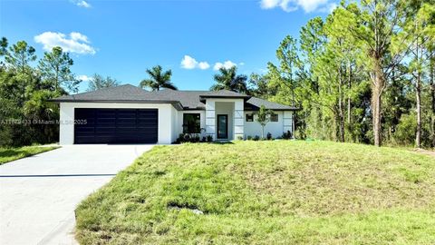 Photo of 2710 52nd st sw, Lehigh Acres, FL 33976 (MLS # A11879433)