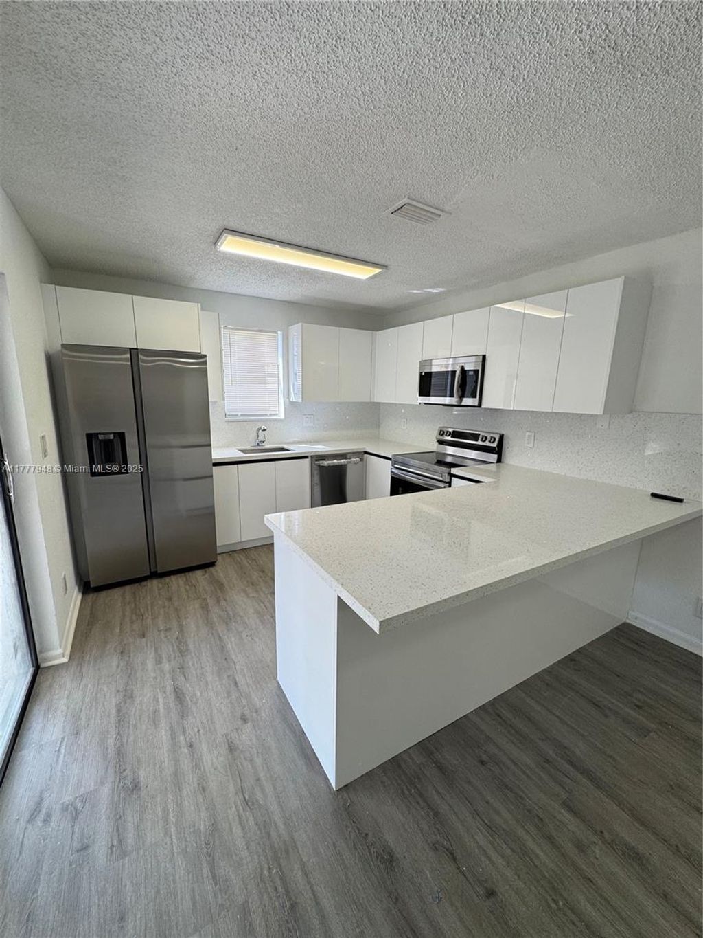 Photo of 2530 NW 99th Ave #2530, Coral Springs, FL 33065 (MLS # A11777948)