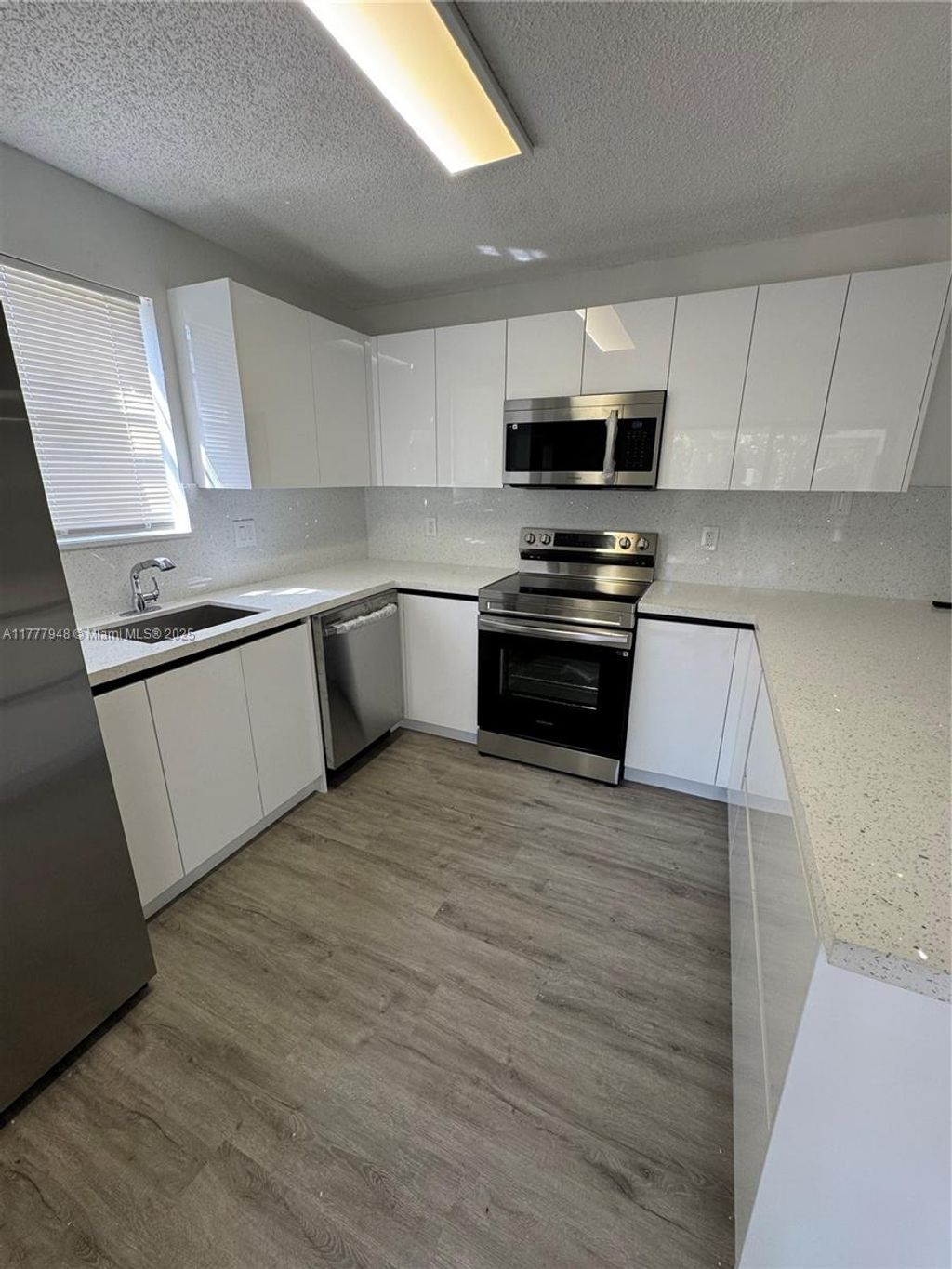 Photo of 2530 NW 99th Ave #2530, Coral Springs, FL 33065 (MLS # A11777948)