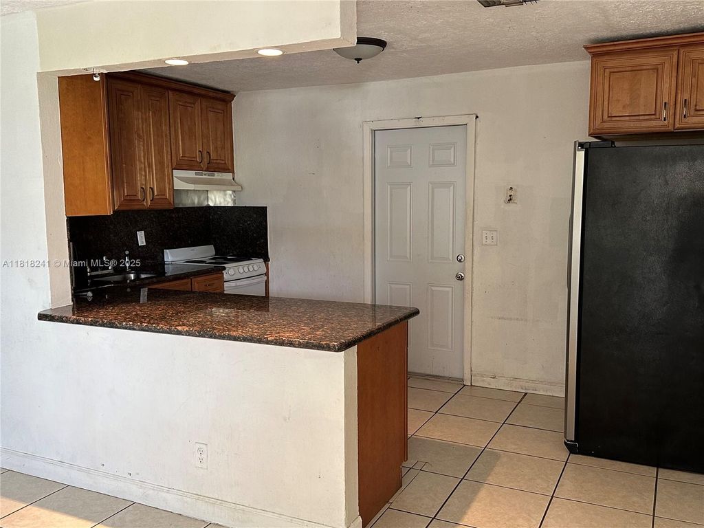 Photo of 5720 SW 36th Ct, Davie, FL 33314 (MLS # A11818241)