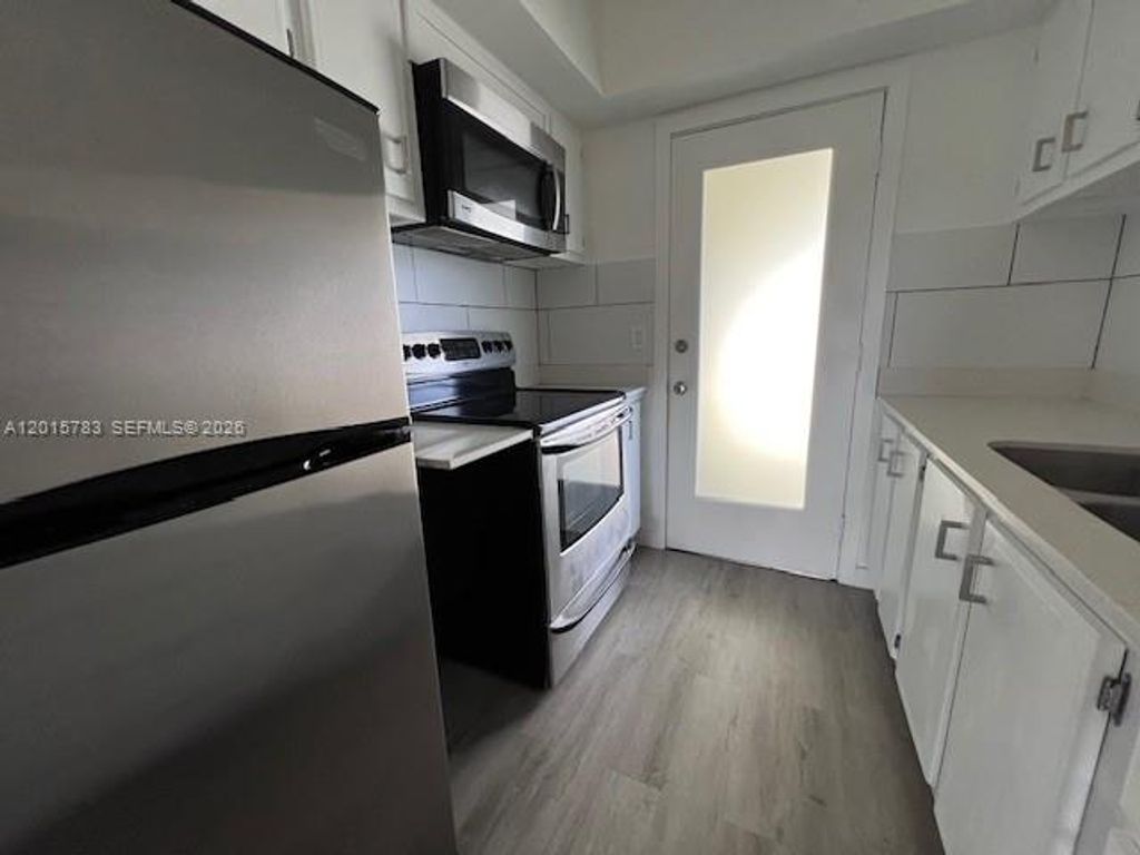 Photo of 1350 E Sample Rd #306, Pompano Beach, FL 33064 (MLS # A12015783)