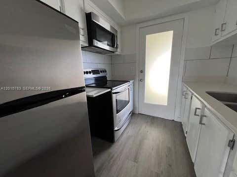 Photo of 1350 E Sample Rd #306, Pompano Beach, FL 33064 (MLS # A12015783)