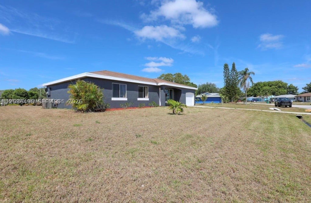 Photo of 250 SW Homeland Rd, Port St Lucie, FL 34953 (MLS # A12086496)