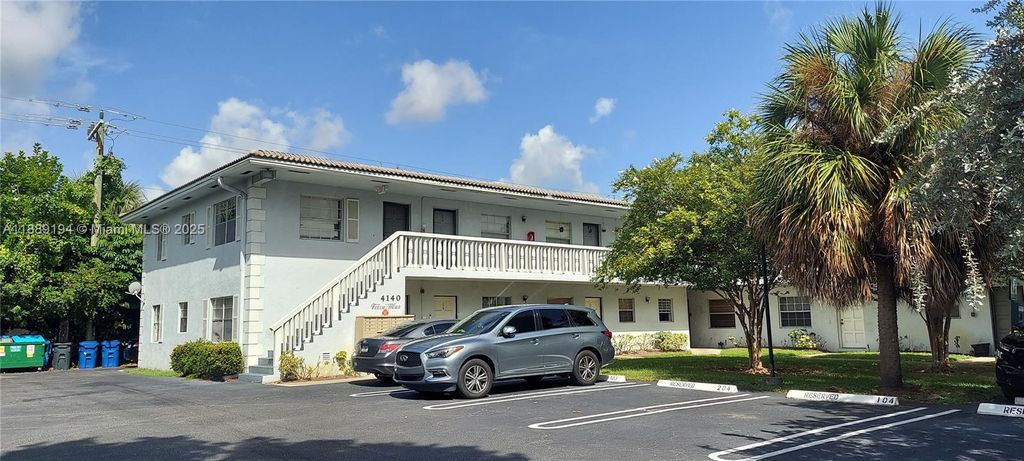 Photo of 4140 Woodside Dr #202, Coral Springs, FL 33065 (MLS # A11889194)