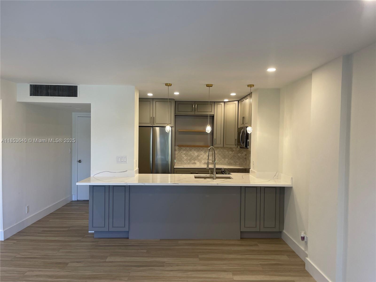 Rarely available Coral Lake Tower condo for sale. 2 BR 2BRA w/balcony in a well managed building. Complete Unit Remodel - North exposure. Pool-area view. Drop ceilings with new LED lighting throughout. New A/C & HW Heather. Kitchen Appliances, Granite countertops, Custom Closets.
Wood-look ceramic Title throughout. Modern Bath, Frameless glass enclosure. Large Custom Closets. New window treatments. Comfortable living space w/Sliders that open to Balcony. New Doors & Hardware. Shutters, Separate Storage Unit. High-speed internet (wired/WIFI). Lobby is secured. Laundry room is 10 steps away. Fresh Market, LA Fitness are walking distance. Funky Buddha, and many restaurants nearby. BEACH& intracoastal Waterway is 5 minutes away!! Min 700 Credit score / 1 parking space/No pets.