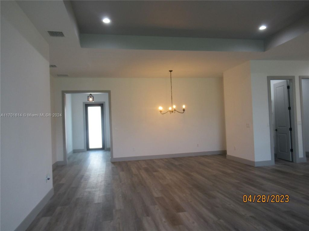 Photo of 541 SW Lawler Ave, Port Saint Lucie, FL 34953 (MLS # A11701614)