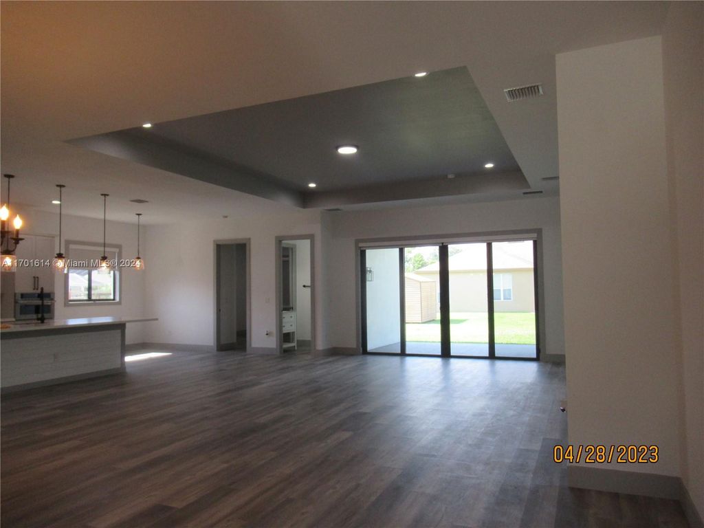 Photo of 541 SW Lawler Ave, Port Saint Lucie, FL 34953 (MLS # A11701614)