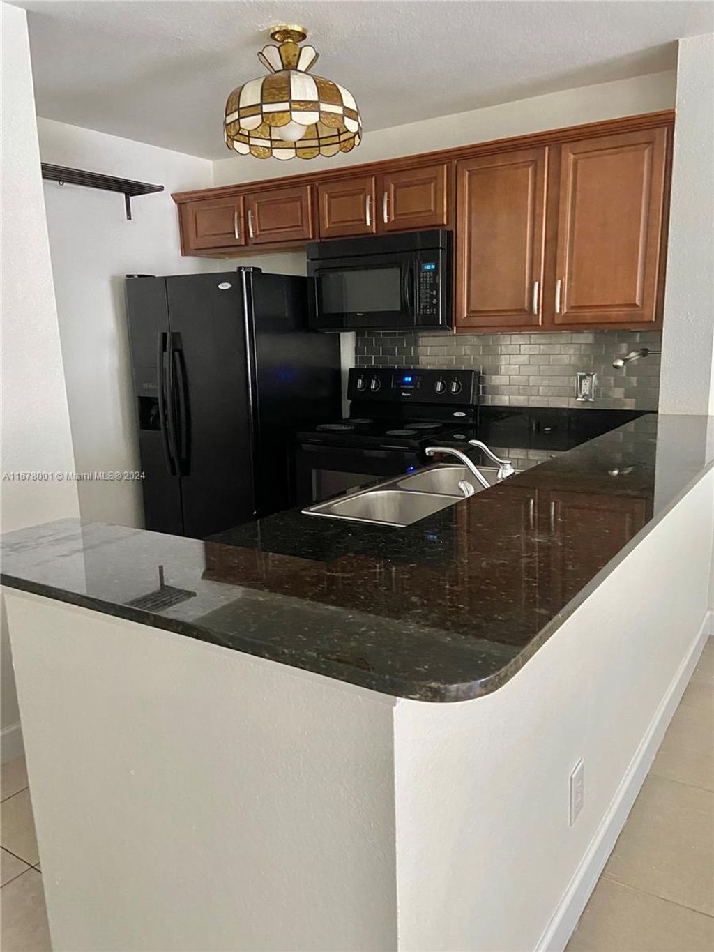 Photo of 1865 Palm Cove Blvd #9-202, Delray Beach, FL 33445 (MLS # A11678001)