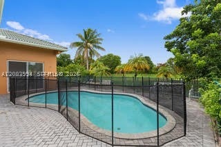 Photo of 10989 NW 56th Ct #N/A, Coral Springs, FL 33076 (MLS # A12083994)