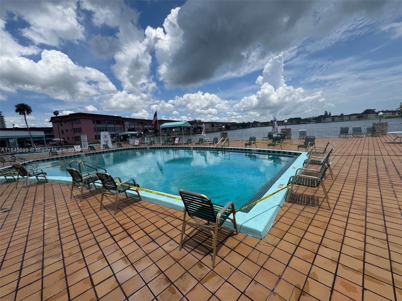 Location, location, location! This charming 55+ Condo is ideally, the unit situated on the first floor, offering easy access and convenience. Just minutes from Aventura, this one-bedroom, one-bath gem comes with amazing amenities: two pools, a library, a theater, game rooms, and a stunning lake view. Perfect for those seeking comfort and community in a prime location!