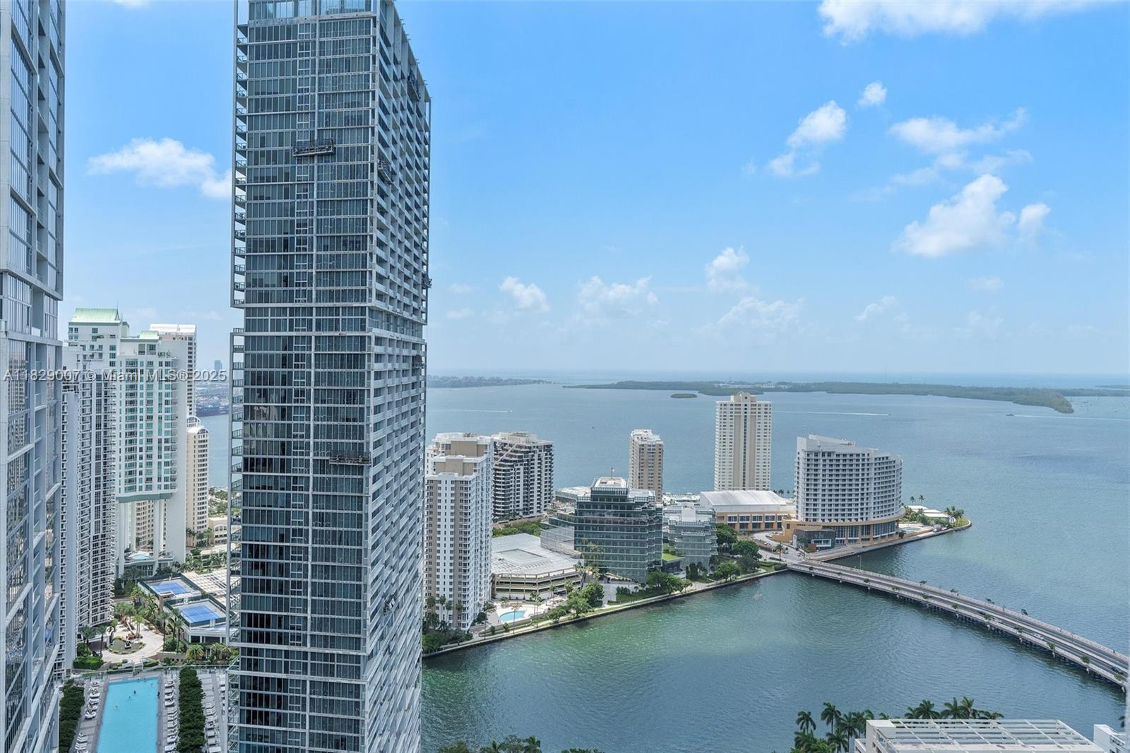 Enjoy sweeping views of the Miami River, ocean, and Brickell skyline from this bright and spacious sub-penthouse. This 3-bedroom, 3-bath condo offers water views from every room, including two generously sized suites each with large walk-in closets. The open layout is filled with natural light, and the kitchen is finished with granite countertops for a clean, polished look. Located near Brickell City Centre, you're just moments from some of the area’s best dining, shopping, and entertainment. Residents also have access to the building’s rooftop, perfect for taking in the city from above. A rare opportunity to enjoy high-rise living with a view from every angle.