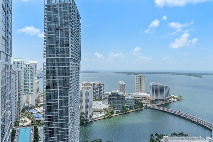 Enjoy sweeping views of the Miami River, ocean, and Brickell skyline from this bright and spacious sub-penthouse. This 3-bedroom, 3-bath condo offers water views from every room, including two generously sized suites each with large walk-in closets. The open layout is filled with natural light, and the kitchen is finished with granite countertops for a clean, polished look. Located near Brickell City Centre, you're just moments from some of the area’s best dining, shopping, and entertainment. Residents also have access to the building’s rooftop, perfect for taking in the city from above. A rare opportunity to enjoy high-rise living with a view from every angle.