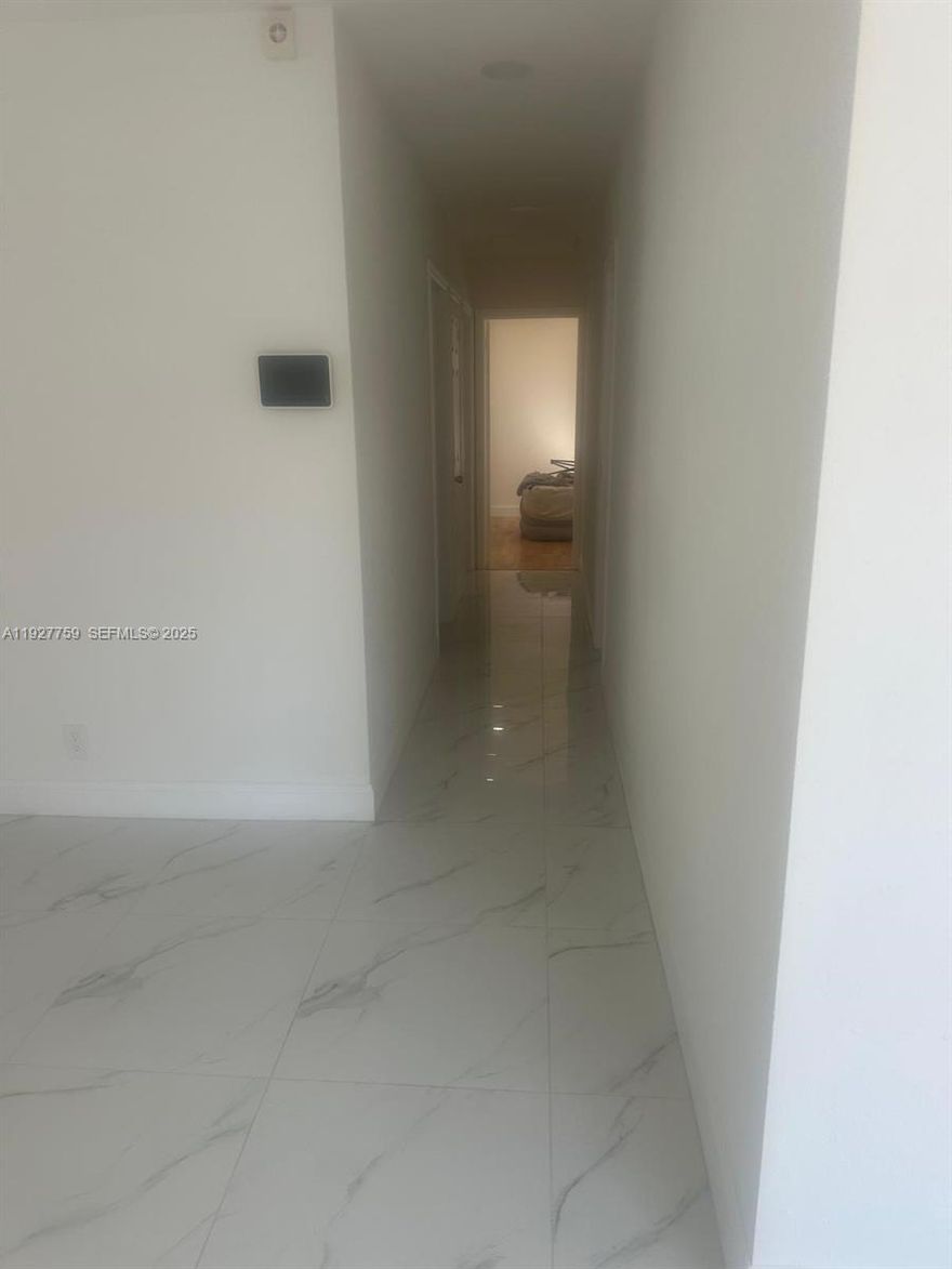 Come bring your suitcases to this completely remodeled 3 Bedroom 2 Bath house with a new roof!  Centrally located and a fantastic street.