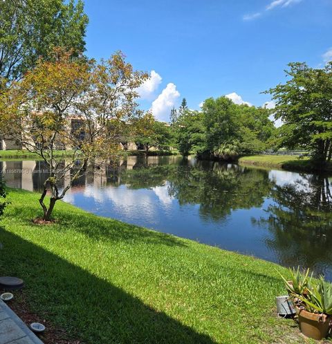 Photo of 302 Lakeview Dr #102, Weston, FL 33326 (MLS # A11850786) Photo of 302 Lakeview Dr #102, Weston, FL 33326 (MLS # A11850786)