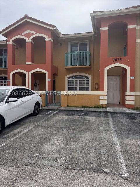 Photo of 7075 NW 173rd Dr #1406, Hialeah, FL 33015 (MLS # A12086629)