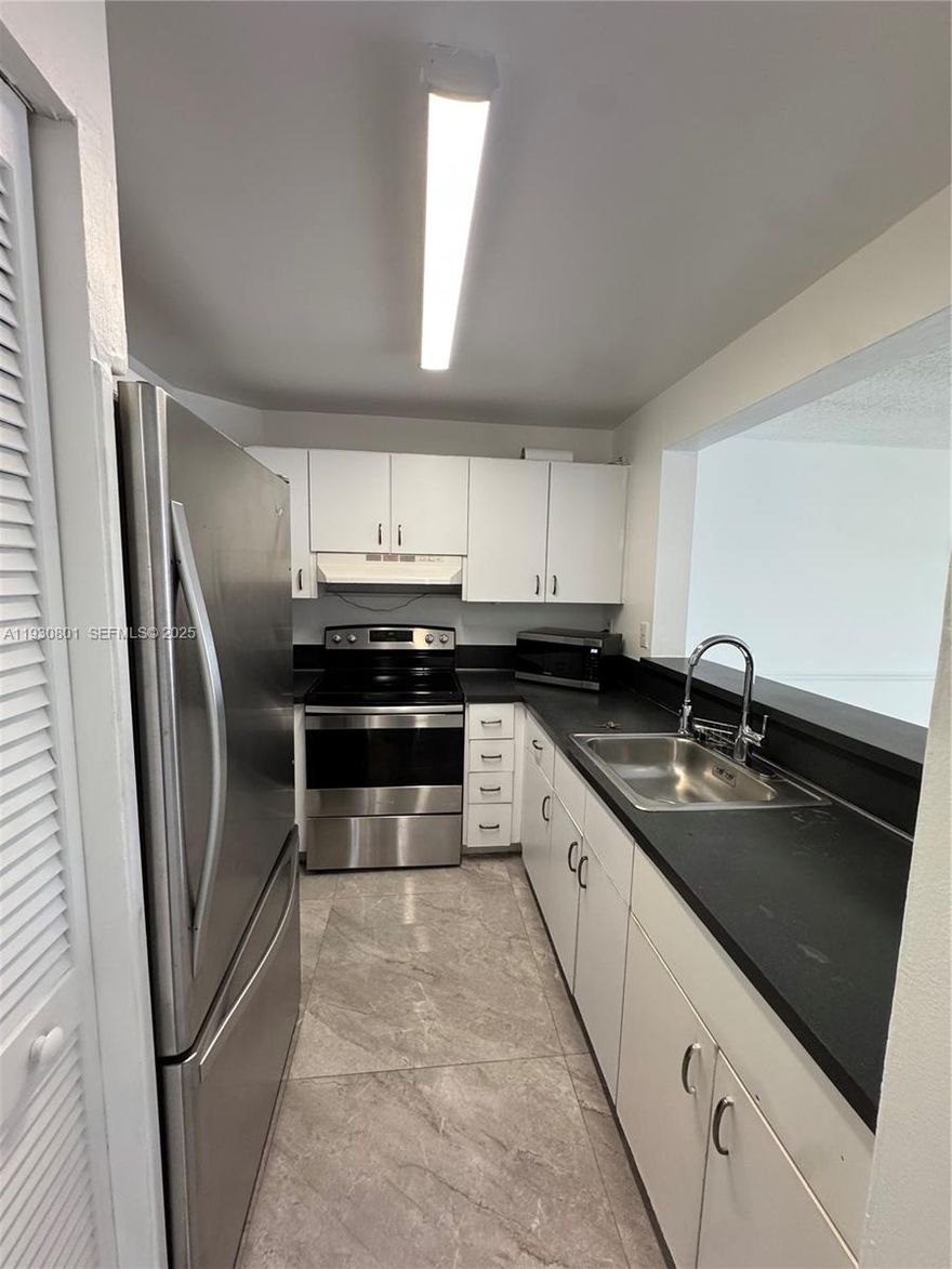 Beautiful, freshly painted property featuring a stunning canal view, located in a quiet and well-maintained community. This move-in ready unit offers 3 bedrooms and 2 bathrooms, bright and spacious living areas, and an excellent layout. Includes washer and dryer, elevator access, and access to a community pool. Water is included. Conveniently located near schools, shopping, and major highways. A great opportunity to enjoy the Miami lifestyle.