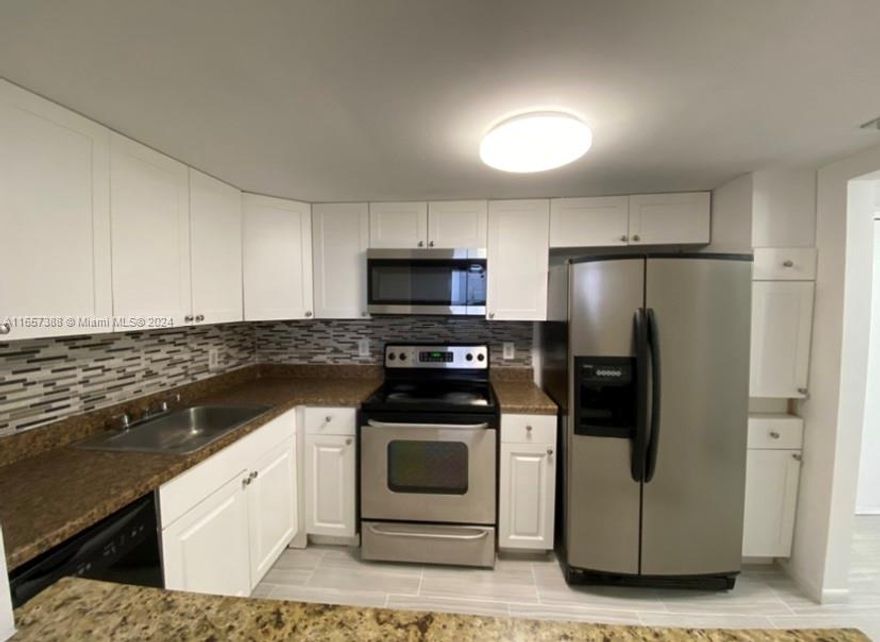 Beautifully renovated floor plan 2/2 apartment with great views. There is one primary suite, another large 2nd bedroom. Renovated floors throughout, flat ceilings, modern open kitchen with new cabinets, counter tops and
stainless steel appliances, new bathrooms floors and balcony with city views. Apt can be rented right away. 24
hours security, laundry facilities, pool, storage and covered parking. Excellent location close to Aventura, I-95,
located close to FIU, Johnson and Wales, Berry University, a short distance from Parks, Malls, and Restaurants and
only a short drive to the Beach. Right on BISCAYNE BLVD Across Street from Starbucks, Banks, Restaurants and
minutes from Costco, Publix and the beaches. Make it your home or a great opportunity for Investors.