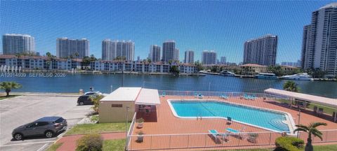 Photo of 2980 E Point East Dr #D301, Aventura, FL 33160 (MLS # A12014939)