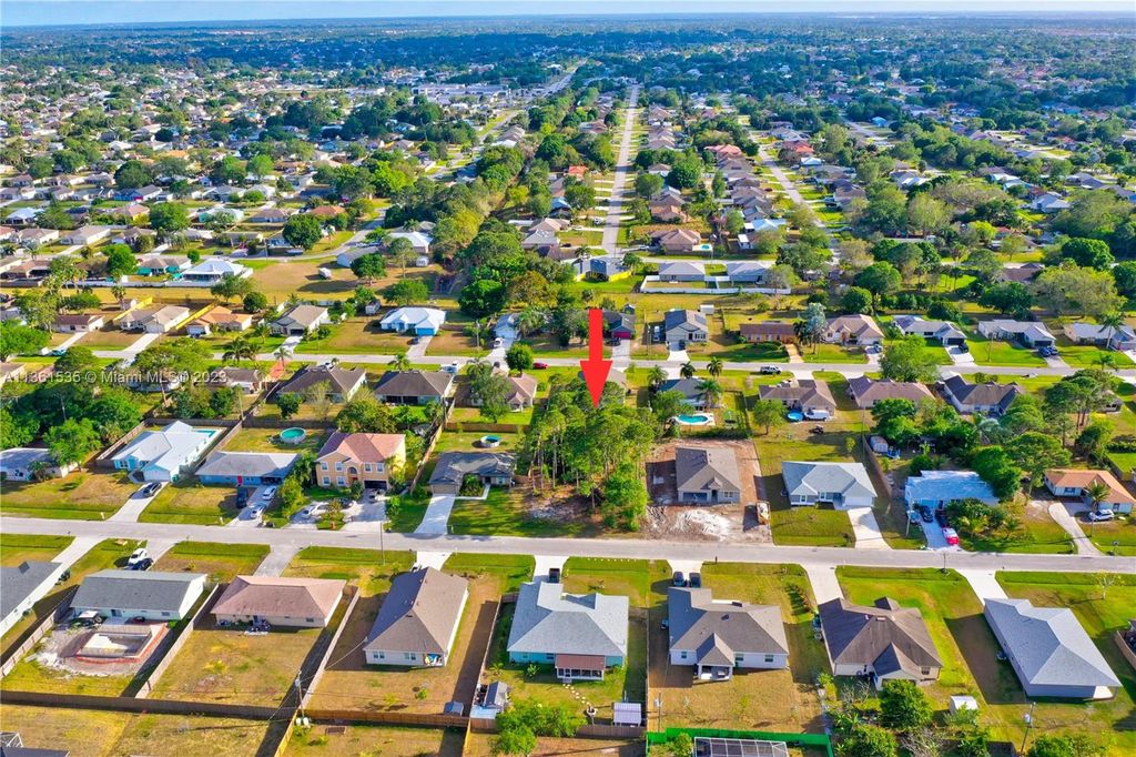 Photo of 1302 Goodman Ave, Port Saint Lucie, FL 34953 (MLS # A11361535)