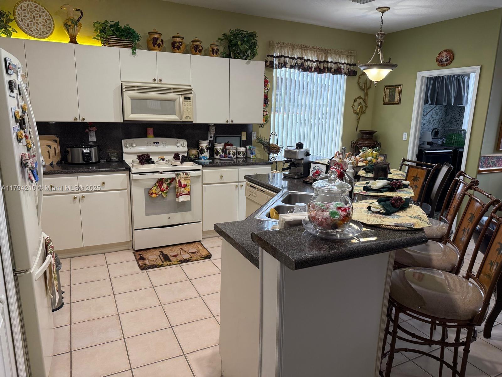 SHOMA HOMES AT TAMIAMI IV - Residential