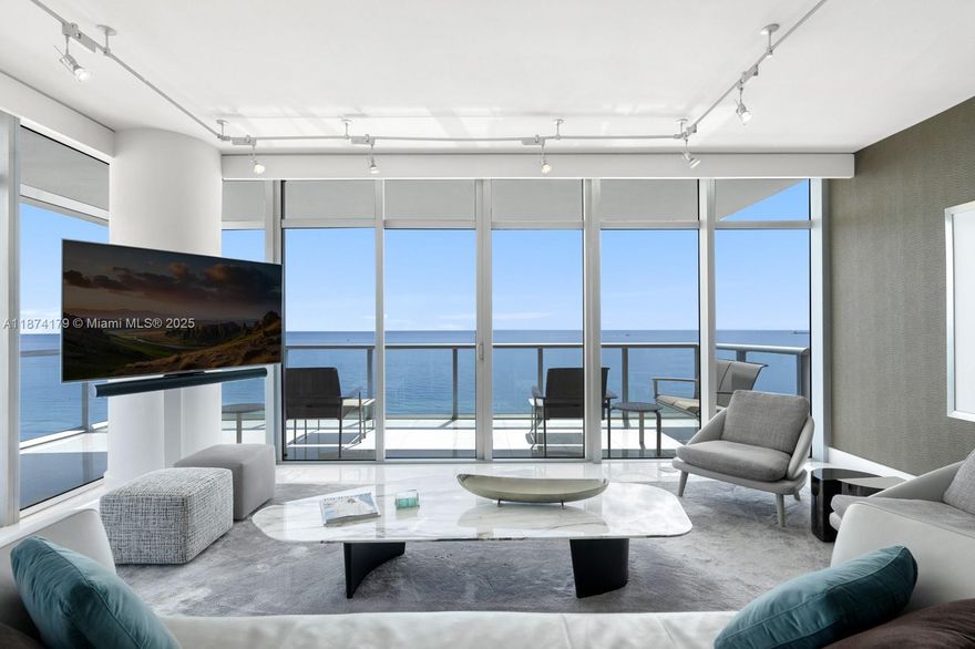 Rarely Available "01" Line with Direct Ocean Views at The Caribbean. Experience unparalleled beachfront living in this Corner Turnkey 3-bedroom, 2.5-bath residence on the 15th floor.  Floor-to-ceiling glass throughout offers dramatic unobstructed ocean views. Step outside onto your 800 sq. ft. wraparound balcony, where seamless indoor/outdoor living awaits—ideal for entertaining, relaxing, or simply soaking in breathtaking sunrises and ocean breezes. Inside, you’ll find a spacious layout with high-end finishes and beautiful design details. Enjoy a luxurious lifestyle with beach and pool service, wine and cigar storage, spa, gym, business center, 24-hour staff, and valet. Stroll the Boardwalk to Faena, Soho Beach House, The Edition, The Fontainebleau, and the upcoming Aman Miami Beach.