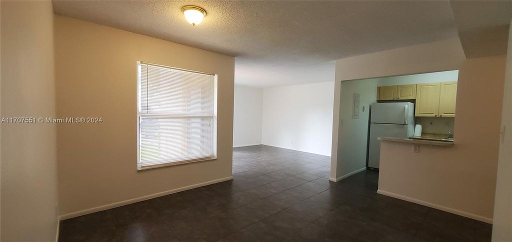 Photo of 605 S Pine Island Rd #101A, Plantation, FL 33324 (MLS # A11707551)