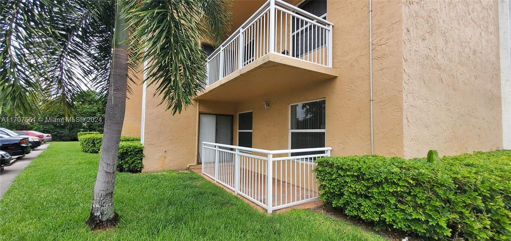 Photo of 605 S Pine Island Rd #101A, Plantation, FL 33324 (MLS # A11707551)