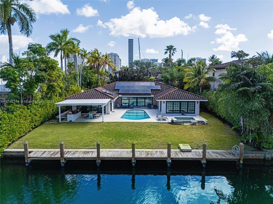 Located in the exclusive, gated enclave of Golden Isles, this stunning 4-bedroom, 4.5-bath waterfront villa spans 3,300 sqft and boasts 85 feet of direct water frontage. Blending timeless mid-century modern architecture with high-end finishes, this home offers unbeatable views and luxury living.
The spacious backyard is ideal for year-round entertaining, complete with a heated pool, in-ground hot spa, and a full outdoor kitchen with covered dining. Enjoy iconic South Florida sunsets or head straight to the Intracoastal via your private dock, perfect for boating enthusiasts.
Just 10 minutes from the sandy shores of Hollywood Beach and Golden Beach, and only 30 minutes to vibrant Downtown Miami.

Fully furnished, this exceptional property is available for annual lease starting July 2026.