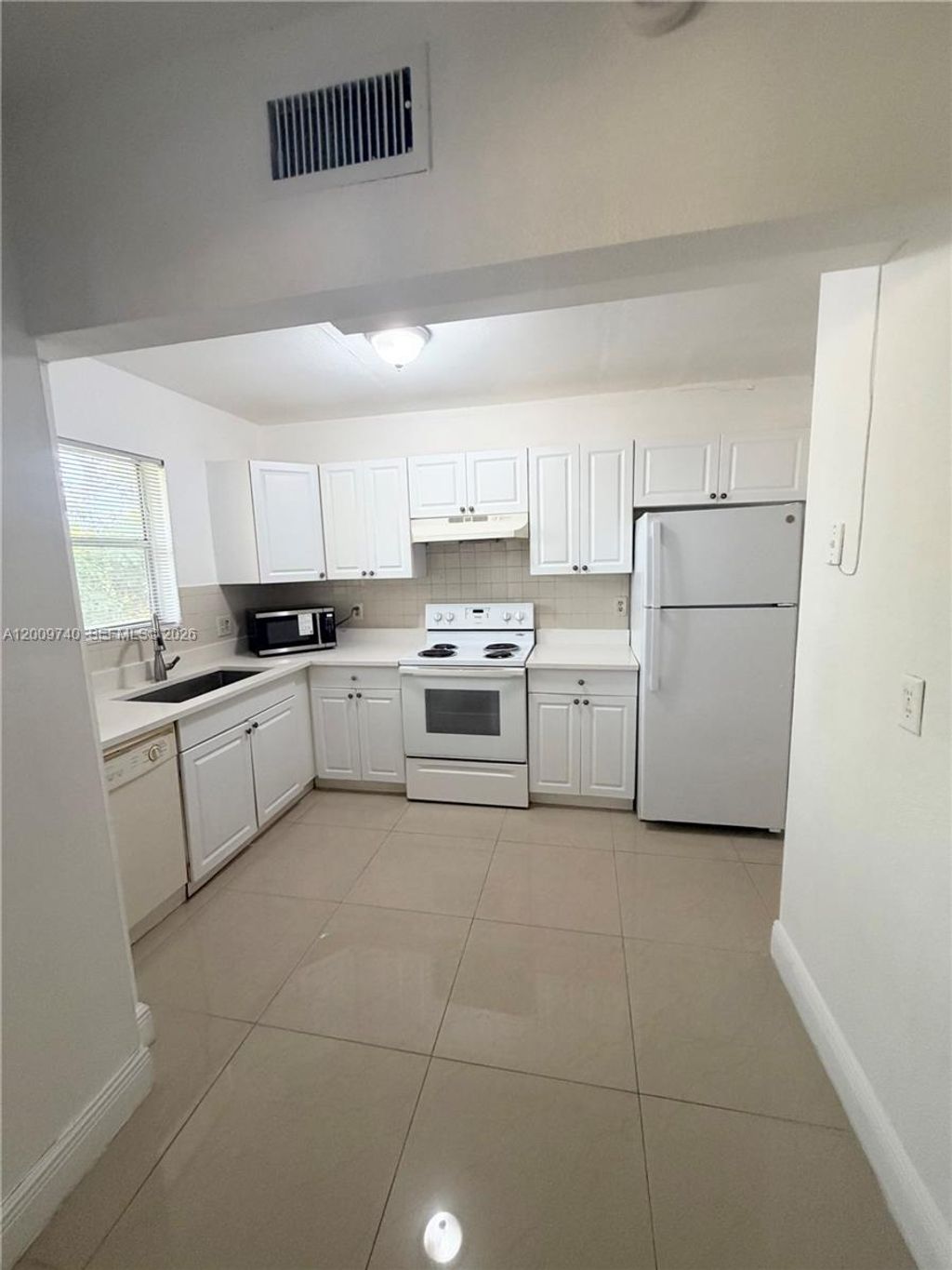 Photo of 10762 La Placida Dr #7-308, Coral Springs, FL 33065 (MLS # A12009740)