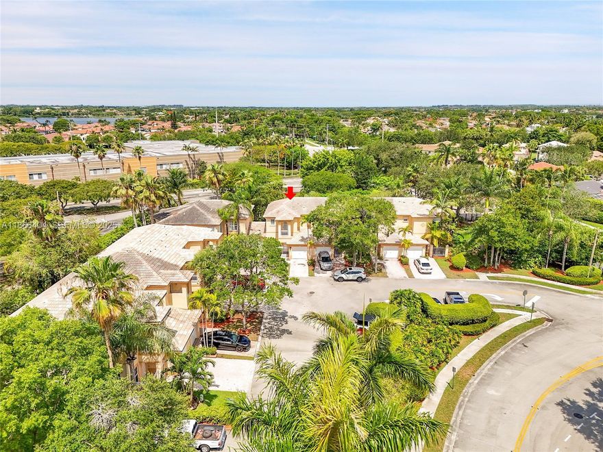 BRAND-NEW 2025 BARREL TILE ROOF installed with permits in this beautifully updated townhome. Nestled in a gated community with a 1-car garage, this home offers an open, airy layout filled with natural light. Interior highlights include durable waterproof + scratch-resistant flooring, ss appliances, granite countertops, Calacatta quartz surfaces & a new washer/ dryer. Outside you'll find a back patio for your enjoyment and you'll have the capability to fence your backyard. Community Amenities: 24/7 security, clubhouse, 3 pools, gym, sauna, pickleball, tennis, basketball, playground. Hurricane protection for peace of mind. HOA ($395/month) includes: Cable TV, lawn care, ADT alarm, internet/Wi-Fi. OK TO LEASE RIGHT AWAY. No HOA approval needed.