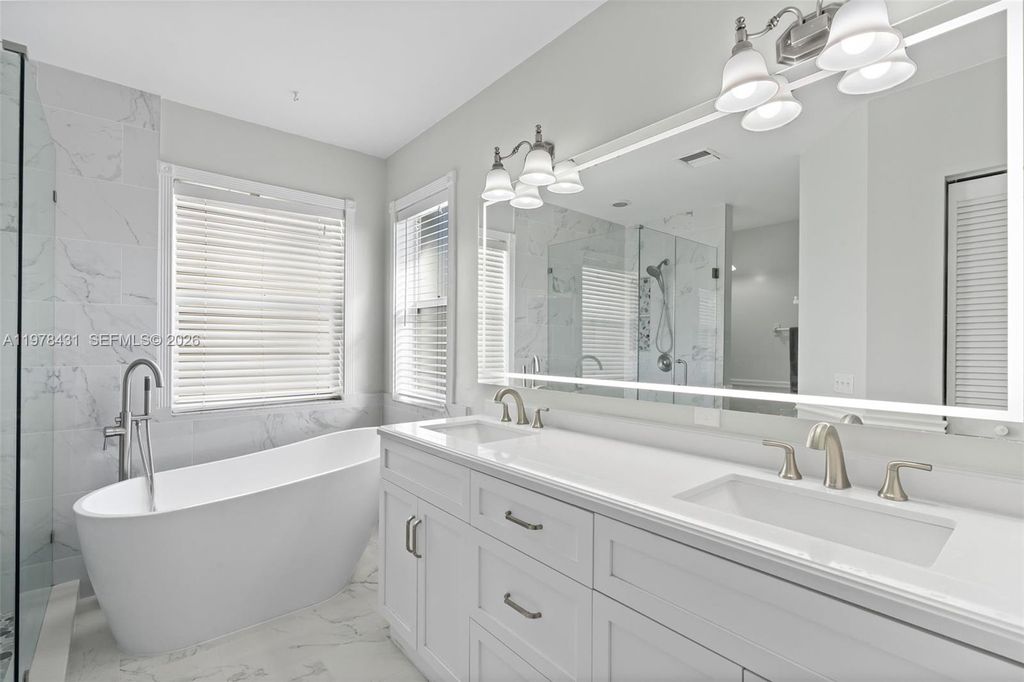 Photo of 9838 NW 1st Mnr, Coral Springs, FL 33071 (MLS # A11978431)