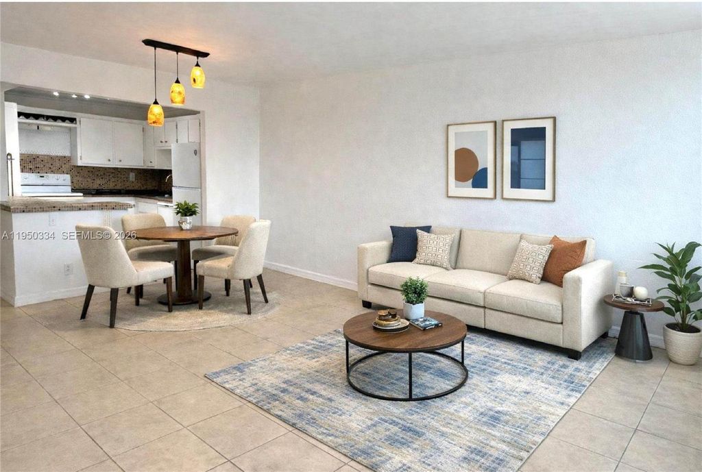 Photo of 2771 Taft St #411, Hollywood, FL 33020 (MLS # A11950334)