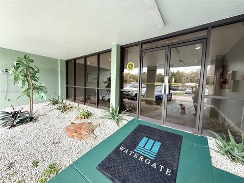 Photo of 2771 Taft St #411, Hollywood, FL 33020 (MLS # A11950334)