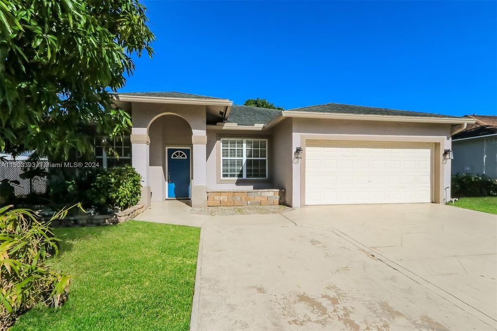 Photo of 1017 Cape Cod Ter, Green Acres, FL 33413 (MLS # A11503393)