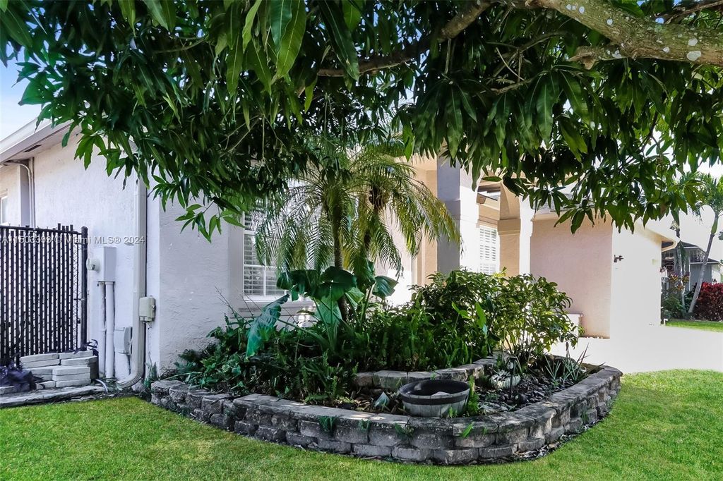 Photo of 1017 Cape Cod Ter, Green Acres, FL 33413 (MLS # A11503393)