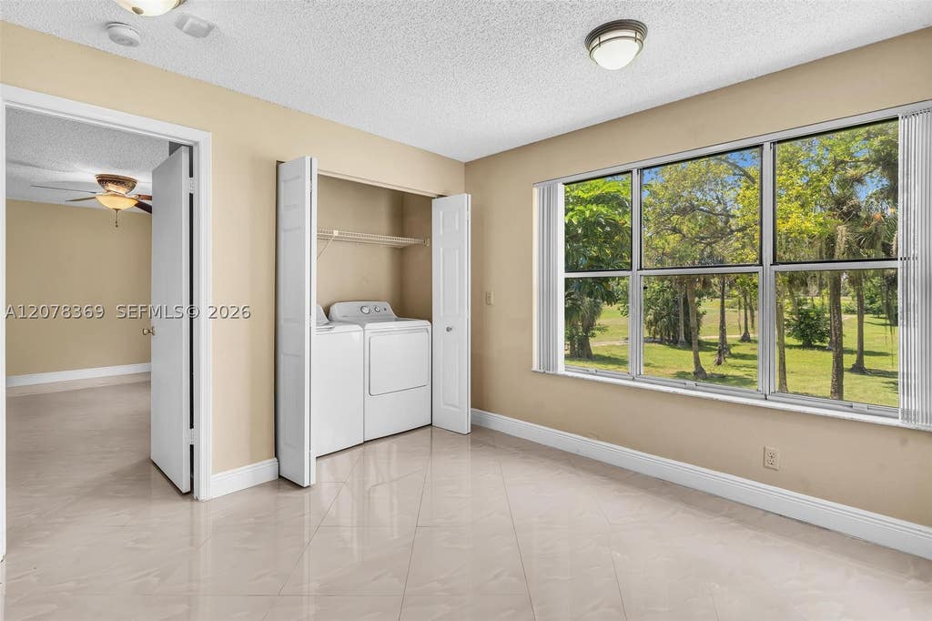 Photo of 3370 Pinewalk Dr N #1222, Margate, FL 33063 (MLS # A12078369)