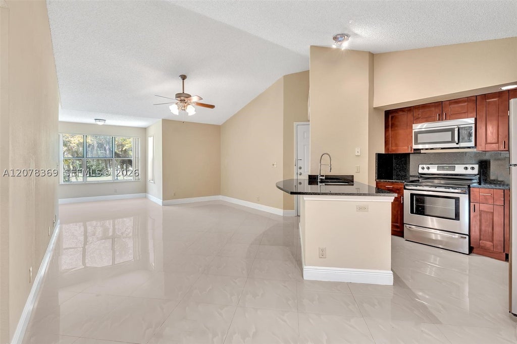 Photo of 3370 Pinewalk Dr N #1222, Margate, FL 33063 (MLS # A12078369)