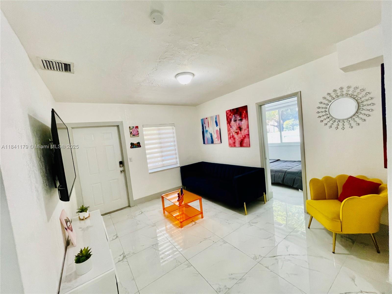 IMPECCABLE FULLY FURNISHED 3-BED HOME Fully equipped kitchen with stainless steel appliances, renovated bath and kitchen, impact windows protection, comfortable bedrooms with beds & closets ready to use, modern living & dining areas with stylish furniture, Laundry area, Yard to enjoy Florida’s outdoor lifestyle, ceramic floors, 2 parking spaces, Includes FPL, water and internet services PRIME LOCATION WYNWOOD, DESIGN DISTRIC AND MIDTOWN MIAMI AREA · READY TO MOVE IN. FAST APPROVAL. AVAILABLE FOR RENT 6 MONTHS O MORE. FURNISHED OR UNFURNISHED.