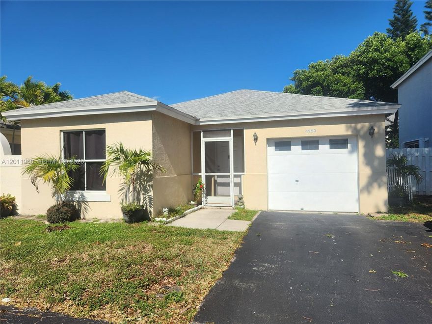 Don't miss out on this rare opportunity to own a 2/2 home in Country Creek!  Priced well to make this home your own!  Split bed floorplan. Additional room off of family room.  Spacious kitchen, new refrigerator (2026), roof (2014). full sized new washer & dryer. Large, screened patio, perfect for entertaining, Fully fenced, low-maintenance backyard. One car attached garage and additional 2 space driveway with guest/extra parking a few steps away. . The community offers a beautiful pool, playground, & bike path behind the property. LOW HOA! Quietly tucked off of Orange Drive. Conveniently located to great schools, Nova University, Broward College, houses of worship, shopping, restaurants, parks, hospitals, and major highways. This home is waiting for YOU to make it your new Home Sweet Home!
