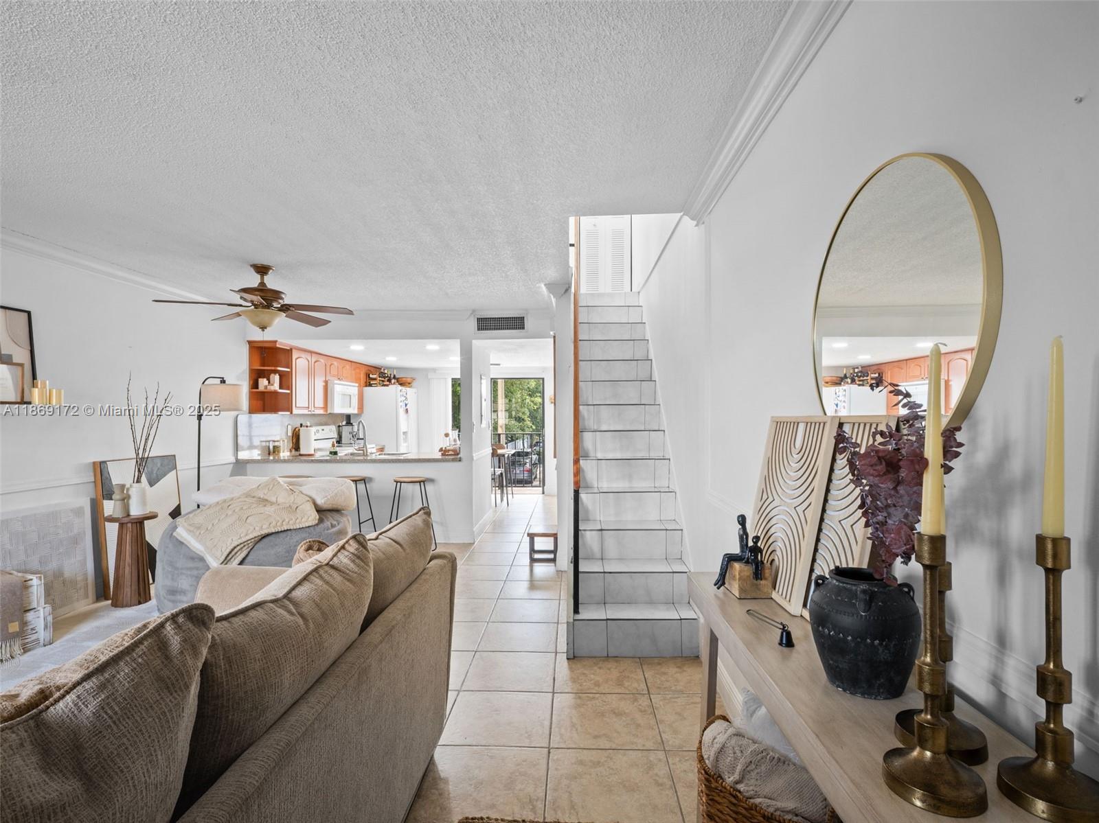 Located in Carmel Town Homes, this cozy 2-bedroom, 1.5-bath residence offers 1,019 sq. ft. of comfortable living space in the heart of Hialeah. Features include a spacious living area, a fully equipped kitchen with electric range, stove, and refrigerator, plus the convenience of an in-unit washer and dryer. Two assigned parking spaces. Centrally located near shopping, dining, schools, and major highways, this home combines convenience, comfort, and value.