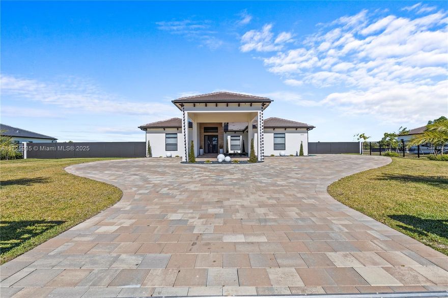 WELCOME TO THIS STUNNING MODERN OASIS IN THE HEART OF THE REDLANDS, MIAMI, FLORIDA.
THIS EXQUISITE 5 BEDROOMS, 3.5 BATHROOMS HOME OFFERS A LUXURIOUS LIVING EXPERIENCE, BOASTING 3,903 SQUARE FEET OF AIR-CONDITIONED LIVING SPACE AND A SPACIOUS 1-ACRE LOT.
THIS HOME IS IMPECCABLY UPDATED WITH SLEEK FINISHES AND HIGH CEILINGS. PERFECT FOR ENTERTAINING, WITH BEAUTIFUL CABINETRY AND HIGH END DETAILS. IS HAS A LARGE 17X32 POOL, PORCELAIN TILE THROUGHOUT THE HOUSE. ITS EQUIPPED WITH A STATE OF THE ART SECURITY CAMERA SYSTEM AND AUTOMATIC GATE OPER FOR PRIVATE GATE. THIS DREAM HOME IS A RARE FIND IN THE REDLANDS. DON'T MISS YOUR CHANCE AND SCHEDULE YOUR PRIVATE SHOWING TODAY.