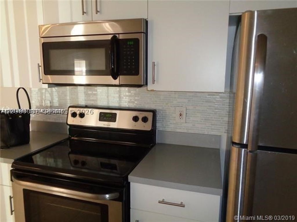 Photo of 3271 Sabal Palm Mnr #103, Davie, FL 33024 (MLS # A12060002)