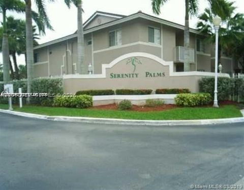 Photo of 3271 Sabal Palm Mnr #103, Davie, FL 33024 (MLS # A12060002)