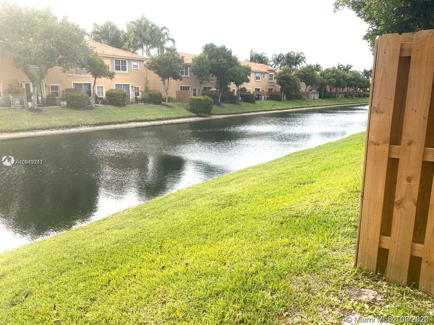 The incredible Villas at Harbor Isles. AMAZING LAKE VIEW. This 3/3 townhouse is perfect home for families. Freshly painted. First floor offers dining room, living room and one bedroom along with 1 full bath. Tile floor throughout. Minutes to major roads, shopping and restaurants. Amenities include children play ground, recreational social room, large community pool, and much more! Available now, CALL LISTING AGENT FOR SHOWING!!!