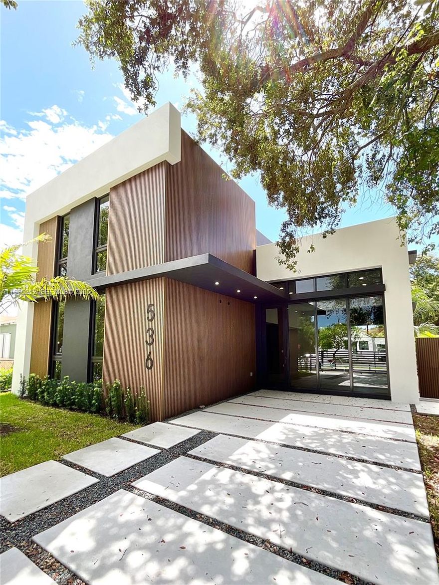 This stunning 2-story, residence is a modern masterpiece that seamlessly blends bold design with refined elegance. Soaring vaulted ceilings and sleek architectural lines create an open, airy atmosphere, while designer finishes are thoughtfully curated throughout. At the heart of the home lies a show-stopping chef’s kitchen, complete with custom cabinetry, a striking oversized island, and seamless flow for effortless entertaining. The residence offers a well-balanced floor plan with bedrooms and bathrooms on both levels, designed to provide privacy, comfort and flexibility. Indoor-outdoor living is redefined with a covered lanai perfect for year-round entertaining, complemented by a sleek pool design that sets the stage for lively gatherings.
INVESTORS:Short-term rental license available.