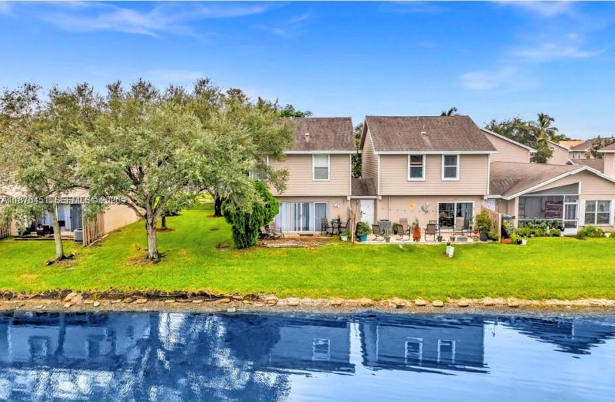 Experience tranquil lakefront living in this two-story villa at Colony Courts. Featuring two spacious primary suites with vaulted ceilings and 2.5 baths, this home offers a bright and functional layout. The main level includes a first-floor entry, open living and dining areas, eat-in kitchen, and built-ins for added storage. Step onto your private patio with wide water views, or enjoy the community pool just steps away. Low HOA covers building exterior, insurance, landscaping, and parking. Pet-friendly with leasing allowed, making it ideal as a primary residence or an income-producing investment. Just minutes to Sawgrass Mall, dining, and the expressway, this home blends comfort, convenience, and resort-style living. Take in views of the lake and landscape during your leisure time weekly. Easy to show.