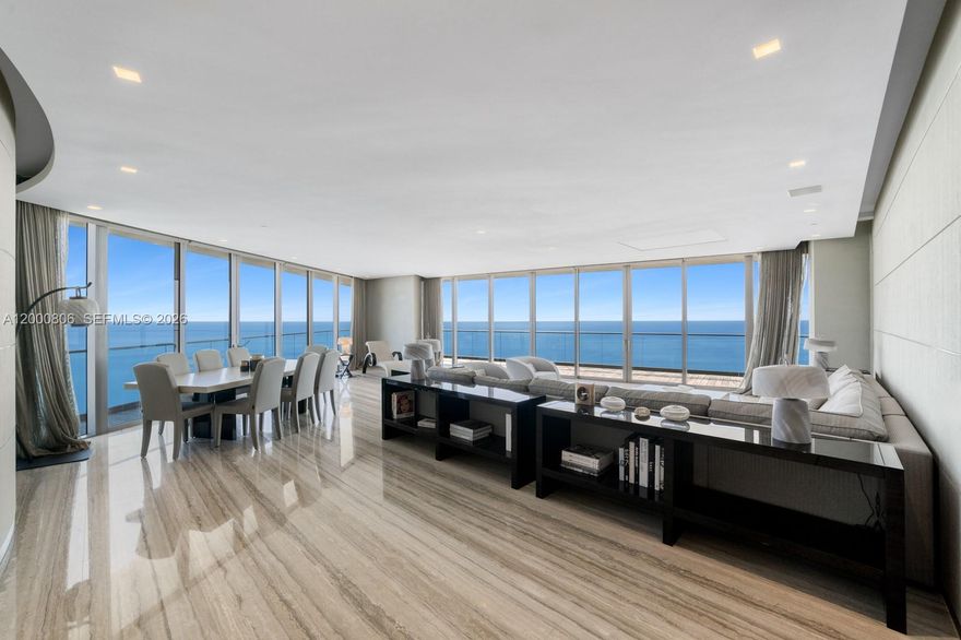 Experience the pinnacle of luxury living at the prestigious Residences by Armani/Casa in the heart of exclusive Sunny Isles Beach. This exceptional 4-bedroom corner residence, situated on the 48th floor, offers over 4,000 square feet of impeccably designed living space with breathtaking views from every room.
Boasting expansive wraparound terraces, this 1-of-a-kind home captures both sunrise & sunset, showcasing sweeping vistas of the Atlantic Ocean, Intracoastal Waterway, & skyline stretching from Downtown Miami to Fort Lauderdale. Floor-to-ceiling glass enhances the seamless indoor-outdoor experience, filling the residence with natural light.
What truly sets this residence apart is its distinction as the only officially designed Armani/Casa residence in the building. Curated entirely by the Armani/Casa design team, the home features exclusive finishes & bespoke elements, including elegant silk wall coverings, custom mirrors & a complete collection of Armani/Casa furnishings, creating a cohesive & refined aesthetic throughout.
Meticulously crafted with unparalleled attention to detail, the residence includes sophisticated lighting design, drop-down televisions, & custom blinds & shades, all thoughtfully integrated to reflect the timeless elegance & understated luxury synonymous with the Armani brand.
This is a rare opportunity to own a true masterpiece in one of South Florida’s most iconic oceanfront addresses, offering the ultimate in privacy, design, & panoramic views.