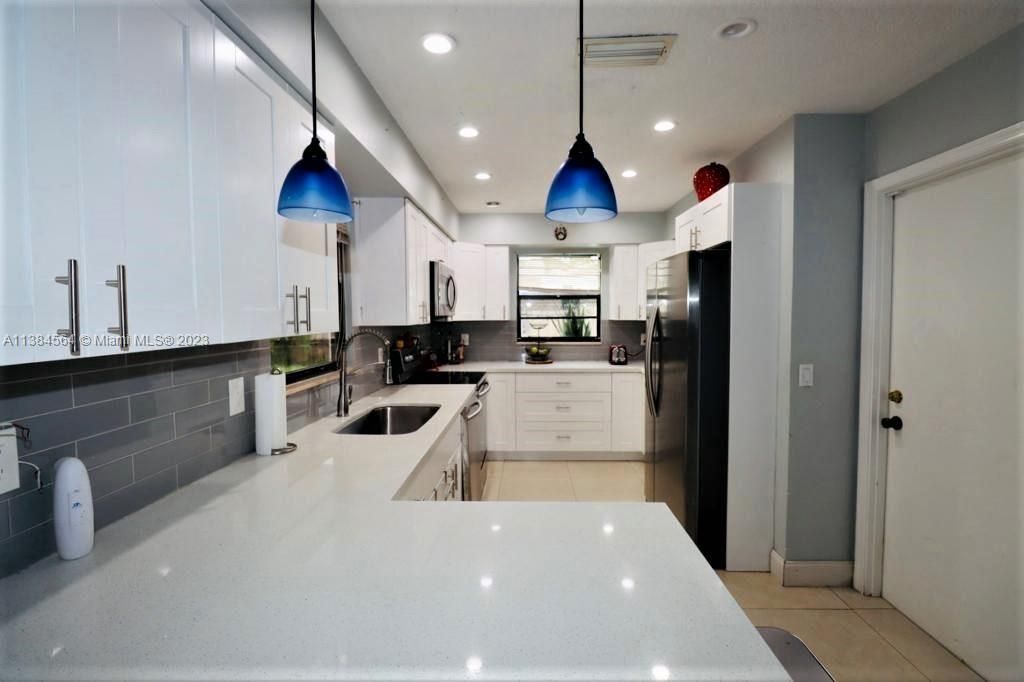 Photo of 9219 Bracelet Dr, Lake Worth, FL 33467 (MLS # A11384564)