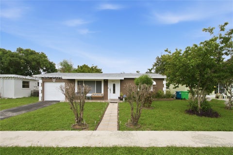 Photo of 5909 NW 16th Ct, Sunrise, FL 33313 (MLS # A12104487)