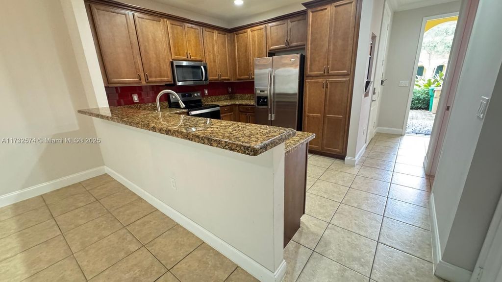 Photo of 7718 Paddock Pl, Davie, FL 33328 (MLS # A11732574)